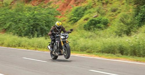 2021 Triumph Speed Triple RS Wheelie Shot1