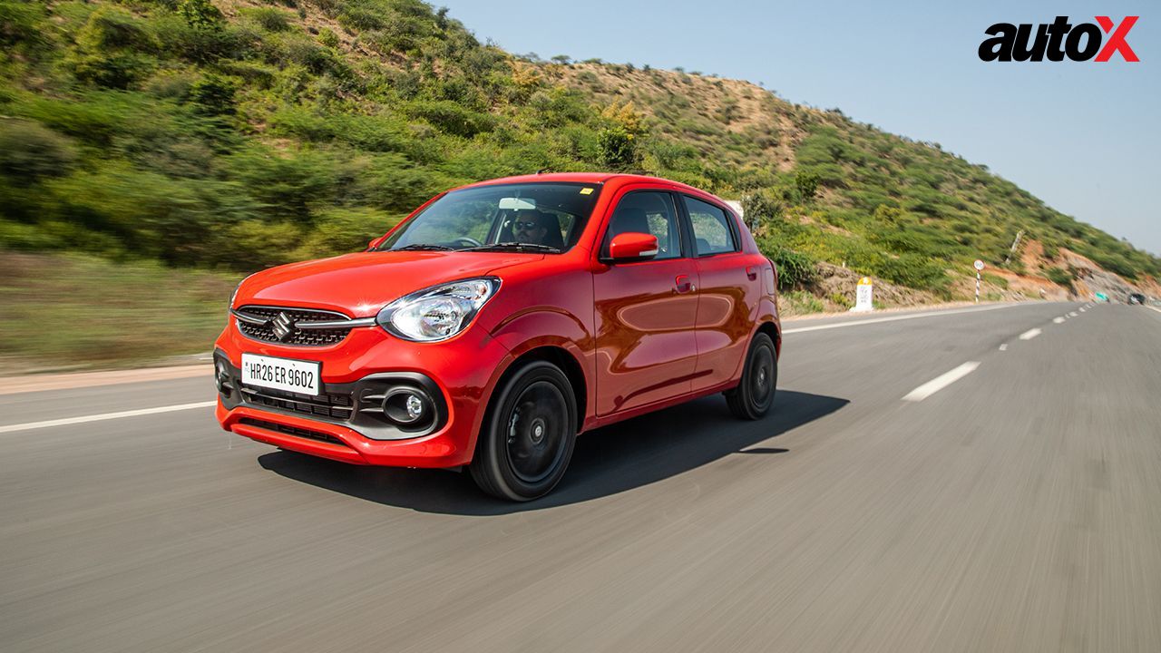 Solid Fire Red Maruti Suzuki Celerio Left Side and Front View