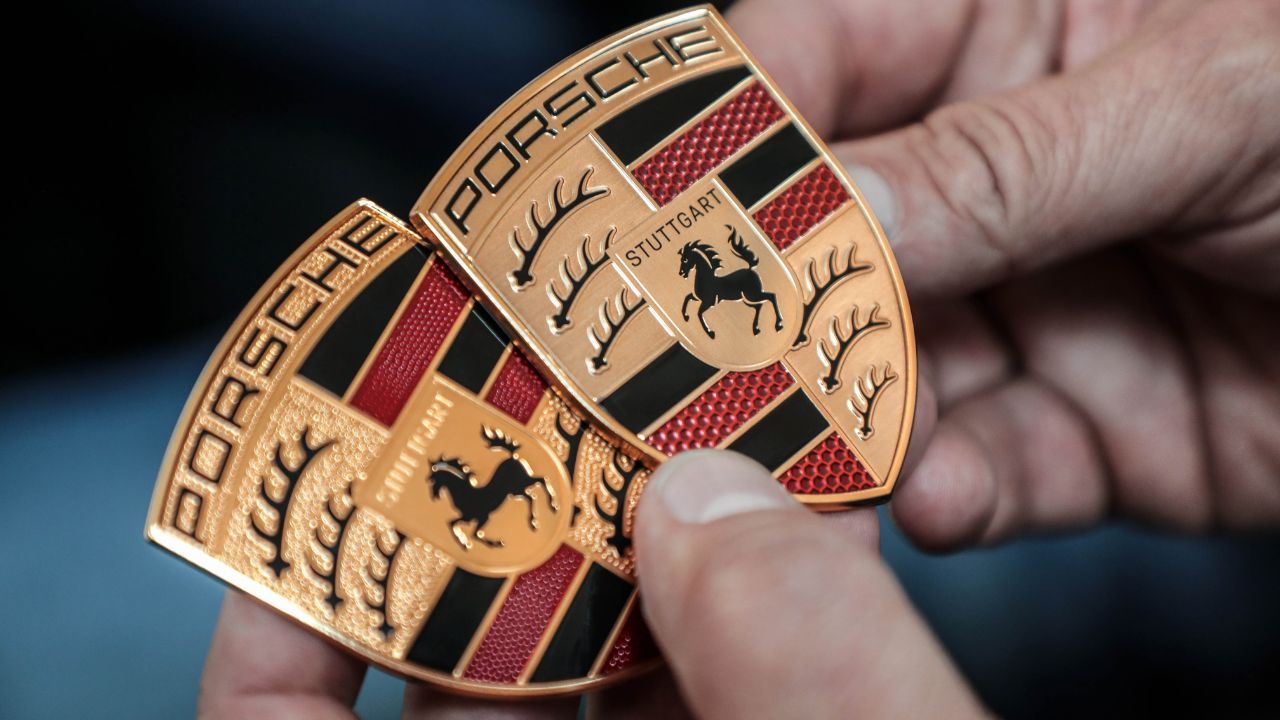 Porsche New And Old Logo