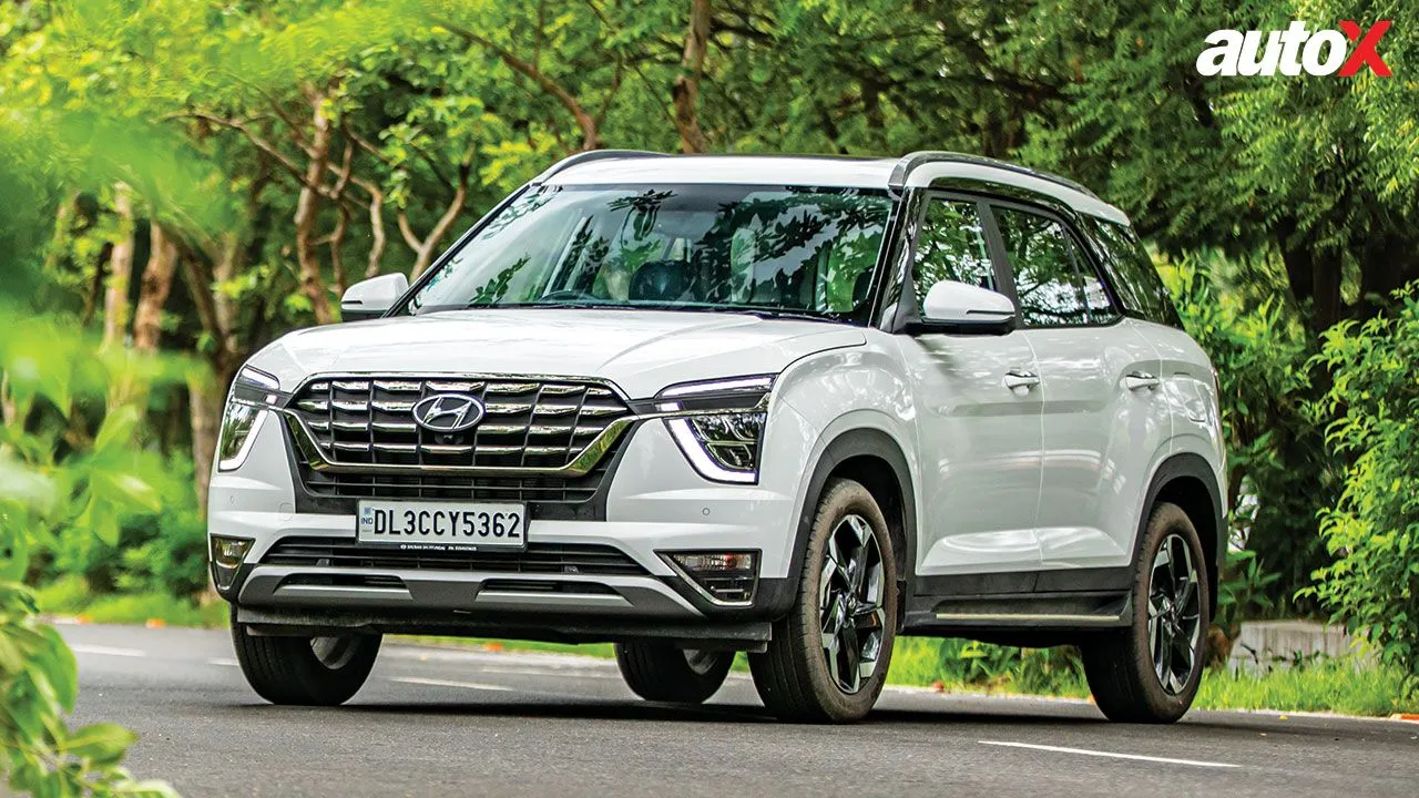 White Hyundai Alcazar Front and Side View