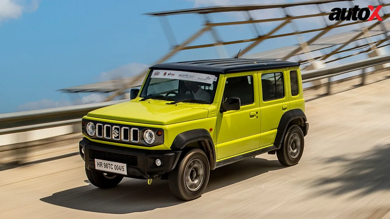 Kinetic Yellow with Bluish Black Roof Maruti Suzuki Jimny Left Side and Front View
