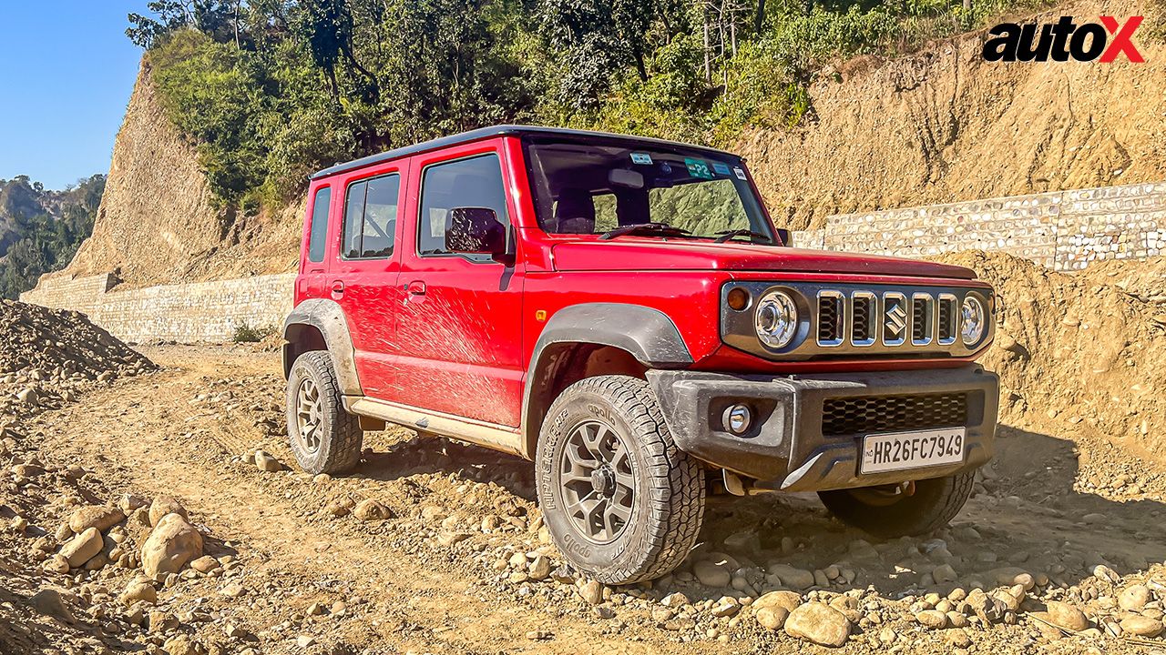 Sizzling Red Maruti Suzuki Jimny Right Side and Front View