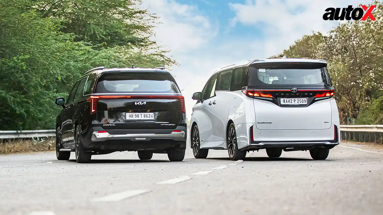 Kia Carnival-Toyota Vellfire-Rear-Three-Quarter.jpg