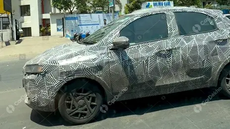 Tata Tiago Facelift Spotted Testing; Reveals Key Design Details
