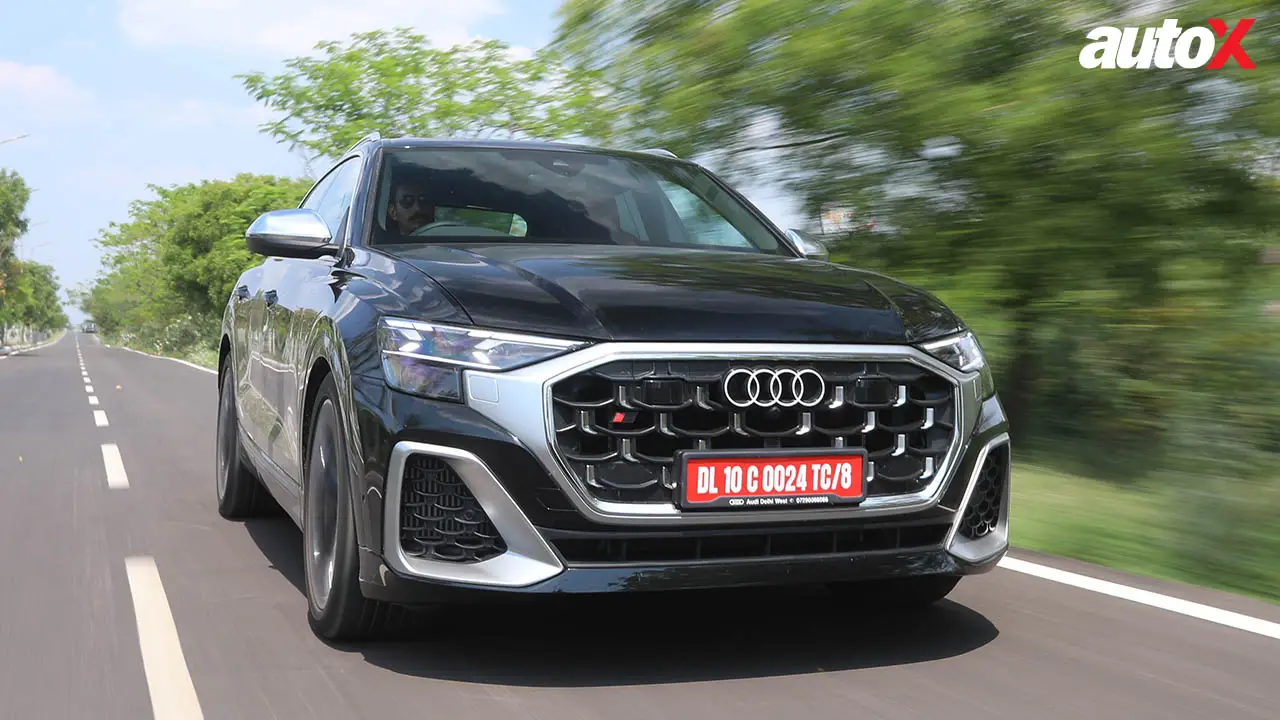 Audi SQ8 driving on road.jpg